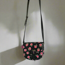 Load image into Gallery viewer, Kate Spade Knott Ditsy Rose Crossbody Black Leather Floral Saddle Bag Small