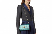 Load image into Gallery viewer, Teal handbag with a gold chain strap on a white background