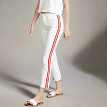 Load image into Gallery viewer, White pants with red stripes worn by a person on a white background