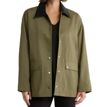 Load image into Gallery viewer, Person wearing a green jacket with a plain background