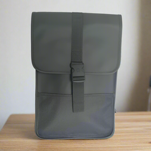 Gray backpack with a strap on a white background