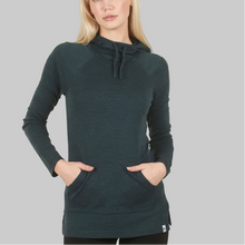 Load image into Gallery viewer, Woman wearing a dark green long-sleeve top with a hood on a beige background