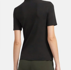 Black t-shirt worn by a person on a white background